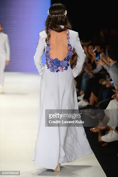 Model walks the runway at the Afffair show during Mercedes-Benz Fashion Week Istanbul at Zorlu Center on October 14, 2016 in Istanbul, Turkey.