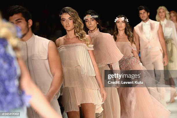 Models walk the runway at the Afffair show during Mercedes-Benz Fashion Week Istanbul at Zorlu Center on October 14, 2016 in Istanbul, Turkey.