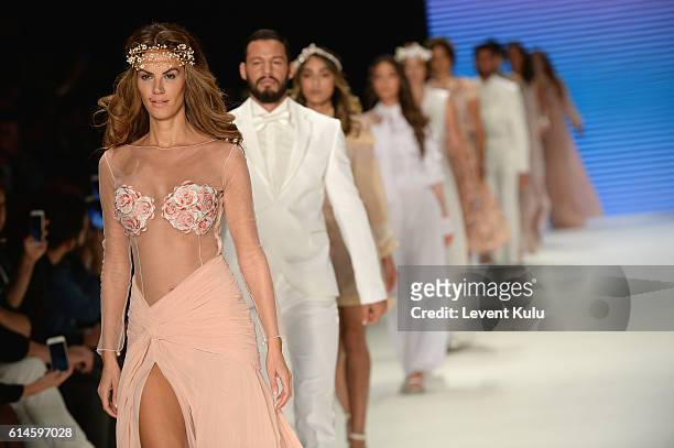 Models walk the runway at the Afffair show during Mercedes-Benz Fashion Week Istanbul at Zorlu Center on October 14, 2016 in Istanbul, Turkey.