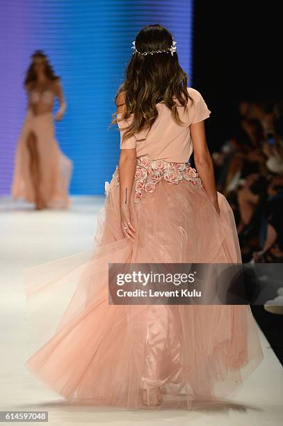 Model walks the runway at the Afffair show during Mercedes-Benz Fashion Week Istanbul at Zorlu Center on October 14, 2016 in Istanbul, Turkey.