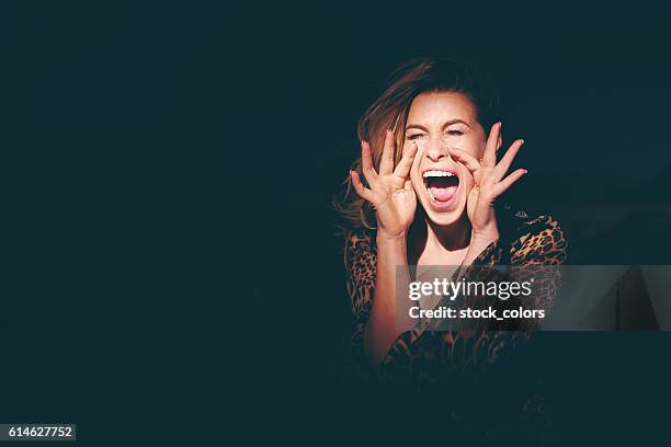 screaming for help - word of mouth stock pictures, royalty-free photos & images