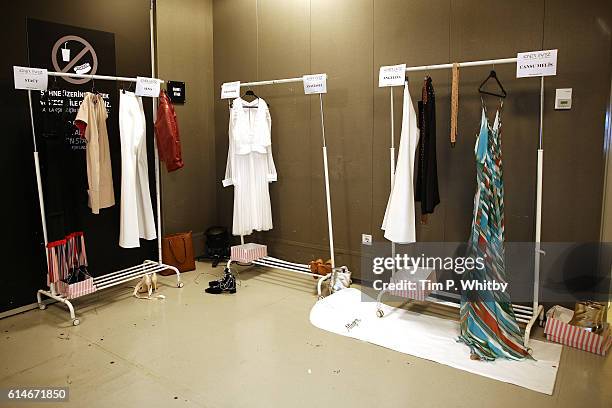 Designs hung backstage ahead of the Ozlem Kaya show during Mercedes-Benz Fashion Week Istanbul at Zorlu Center on October 14, 2016 in Istanbul,...