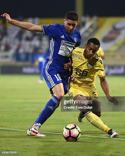 Ali Hassan Salmin of Al Wasl and Abdelaziz Baradda of Al Nasr in action during the Arabian Gulf League match between Al Wasl and Al Nasr at Zabeel...