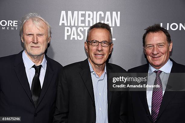 Producers Andre Lamal, Tom Rosenberg and Gary Lucchesi arrive at the premiere of Lionsgate's "American Pastoral" on October 13, 2016 in Beverly...