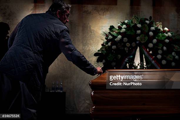 The coffin of Italian artist Dario Fo is pictured in the burial chamber of Teatro Piccolo in Milan on October 14, 2016. Dario Fo an Italian...