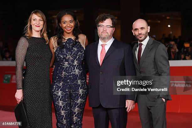 Producers Lauren Beck, Kimberly Steward, director Kenneth Lonergan and producer Josh Godfrey walk a red carpet for 'Manchester By The Sea' during the...