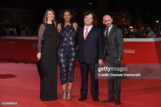 Producers Lauren Beck, Kimberly Steward, director Kenneth Lonergan and producer Josh Godfrey walk a red carpet for 'Manchester By The Sea' during the...