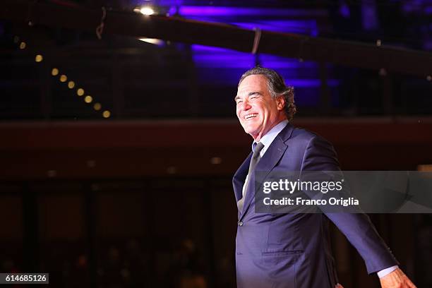 Oliver Stone walks a red carpet for 'Snowden' and 'Powidoki -Afterimage' during the 11th Rome Film Festival at Auditorium Parco Della Musica on...