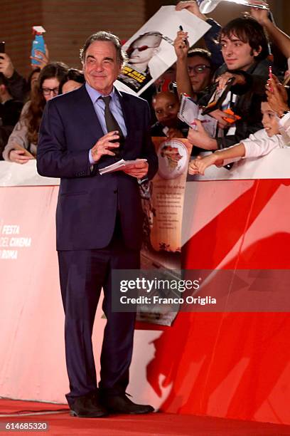 Oliver Stone walks a red carpet for 'Snowden' and 'Powidoki -Afterimage' during the 11th Rome Film Festival at Auditorium Parco Della Musica on...