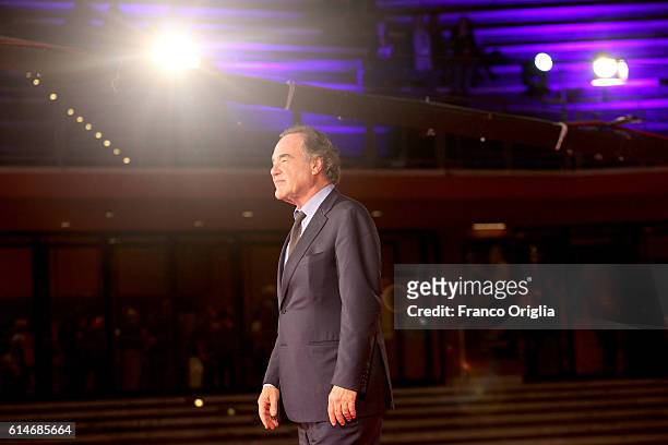 Oliver Stone walks a red carpet for 'Snowden' and 'Powidoki -Afterimage' during the 11th Rome Film Festival at Auditorium Parco Della Musica on...