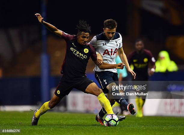 Anthony Georgiou of Tottenham Hotspur battles for the ball with Demeaco Duhaney of Manchester City during the Premier League 2 match between...