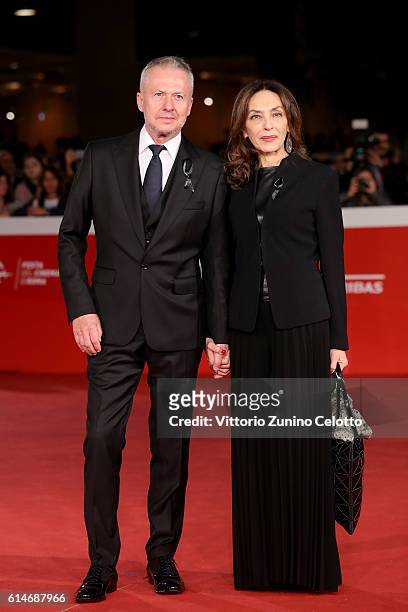 Boguslaw Linda and a guest walk a red carpet for 'Snowden' And 'Powidoki - Afterimage' during the 11th Rome Film Festival at Auditorium Parco Della...