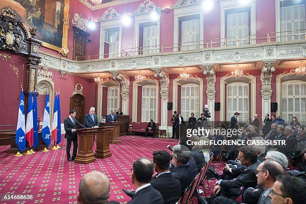 French Prime Minister Manuel Valls speaks at the National Assembly of Quebec with Quebec Premier Philippe Couillard during a press conference in...