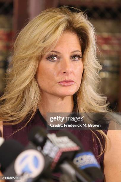 Summer Zervos, a former candidate on The Apprentice season five, who is accusing Donald Trump of inappropriate sexual conduct, speaks to the press...