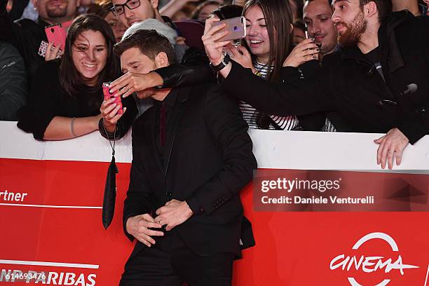 Michael Buble poses with the fans during a red carpet for 'Tour Stop 148' during the 11th Rome Film Festival at Auditorium Parco Della Musica on...