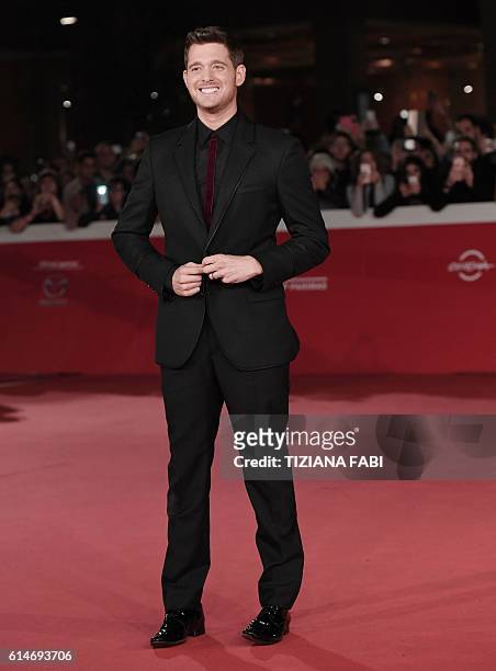 Canadian singer Michael Buble poses on the red carpet as he arrives for the screening of the documentary film "Tour Stop 148" during the 11th Rome...