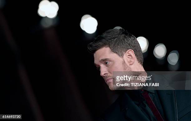 Canadian singer Michael Buble poses on the red carpet as he arrives for the screening of the documentary film "Tour Stop 148" during the 11th Rome...