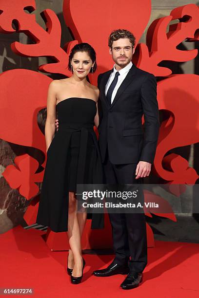 Annabel Scholey and Richard Madden walk a red carpet for 'I Medici' at Palazzo Vecchio on October 14, 2016 in Florence, Italy.