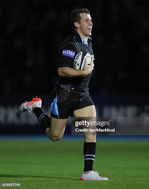 Mark Bennet of Glasgow runs in his first try during the European Rugby Champions Cup match between Glasgow Warriors and Leicester Tigers at Scotstoun...