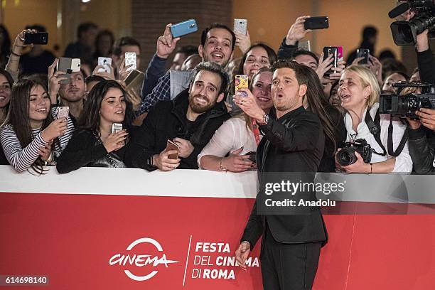 Michael Buble walks a red carpet for 'Tour Stop 148' during the 11th Rome Film Festival at Auditorium Parco Della Musica on October 14, 2016 in Rome,...