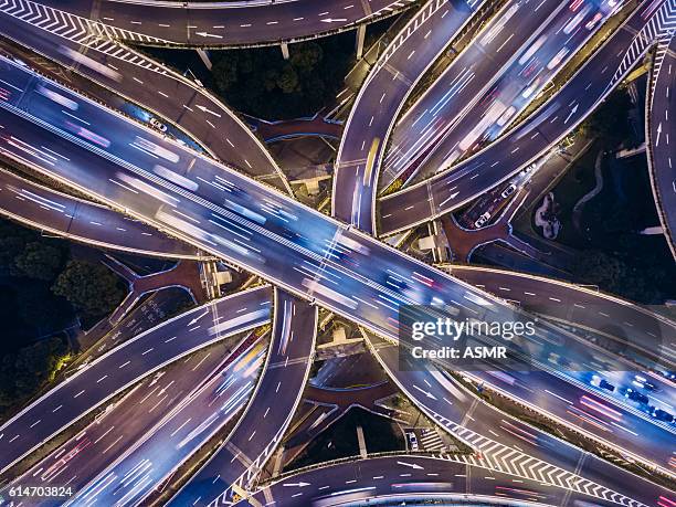 aerial view of shanghai highway at night - traffic aerial stock pictures, royalty-free photos & images