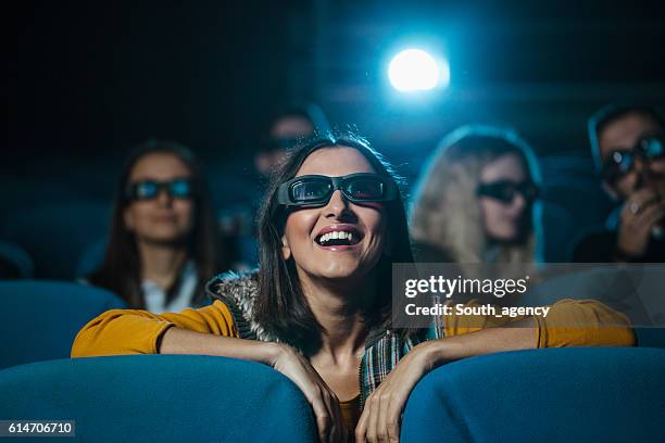 laughing in the theater - loving 2016 film stock pictures, royalty-free photos & images