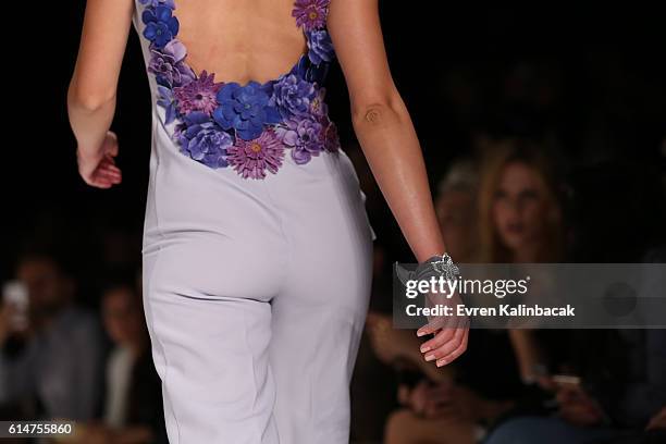 Model, design detail, walks the runway at the Afffair show during Mercedes-Benz Fashion Week Istanbul at Zorlu Center on October 14, 2016 in...