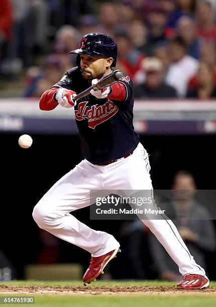 Coco Crisp of the Cleveland Indians bunts in the fifth inning against Marco Estrada of the Toronto Blue Jays during game one of the American League...