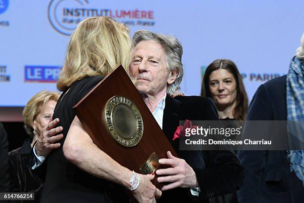 Roman Polanski awards Catherine Deneuve with the Prix Lumiere 2016 award during the 8th Film Festival Lumiere In Lyon on October 14, 2016 in Lyon,...