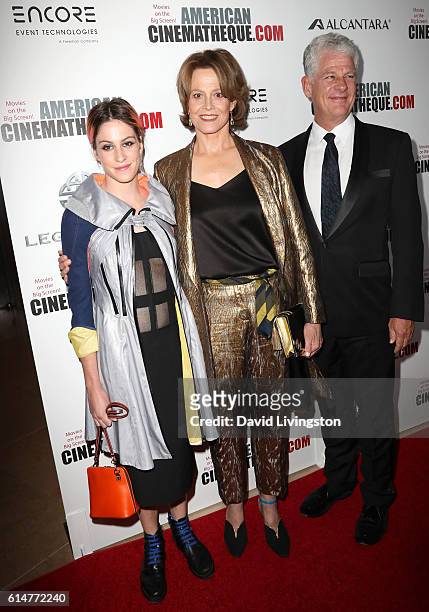 Actresses Charlotte Simpson and Sigourney Weaver and director Jim Simpson arrive at the 30th Annual American Cinematheque Awards Gala at The Beverly...