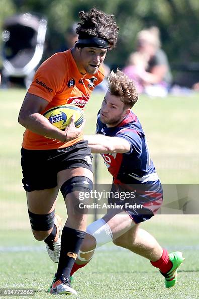 Sam Figg Samuel Figg of the Country Eagles is tackled by the Melbourne Rising ...
