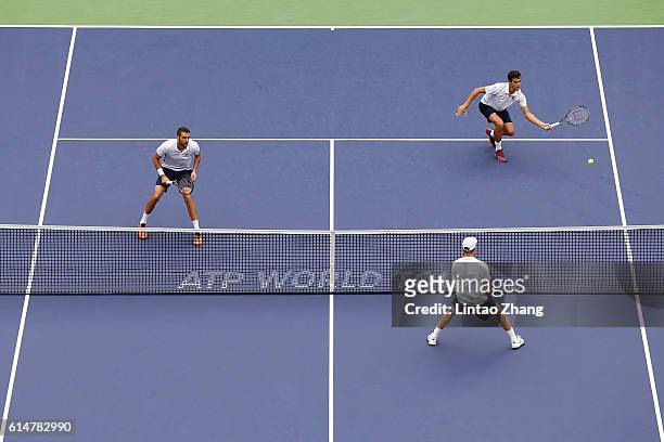 Marin Cilic and Mate Pavic of Croatia in action during the men's doubles Semifinals match against Henri Kontinen of Finland and John Peers of...
