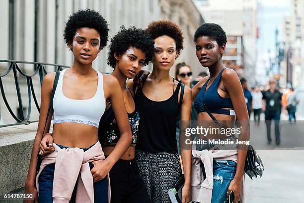 Models Alecia Morais, Amelia Rami, Afrodita Dorado, Amilna Estevao in makeup by Diane Kendal after the TOME show at Skylight Moynihan Station on...