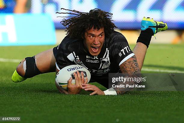 Kevin Proctor of New Zealand crosses for a try during the International Rugby League Test match between the Australian Kangaroos and the New Zealand...