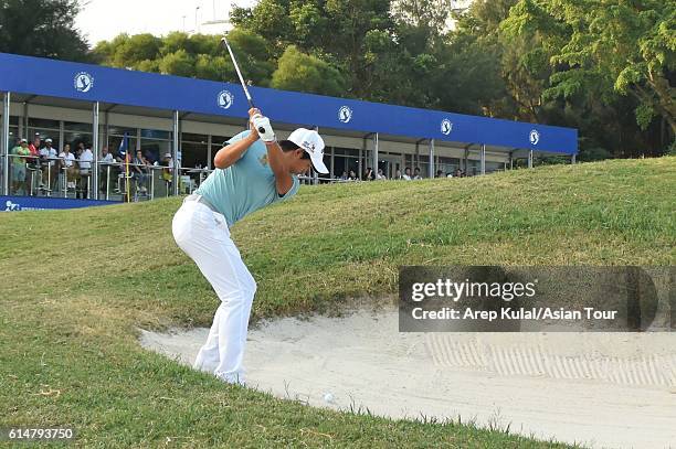 Pavit Tangkamolprasert of Thailand plays a shot during round three of the 2016 Venetian Macao Open at Macau Golf and Country Club on October 15, 2016...