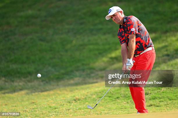 Scott Hend of Australia plays a shot during round three of the 2016 Venetian Macao Open at Macau Golf and Country Club on October 15, 2016 in Macau,...