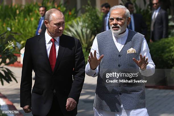 Russian President Vladimir Putin and Indian Prime Minister Narendra Modi walk together at Taj Exotic Hotel on October 2016 in Benaulim, Goa, India....