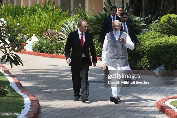 Russian President Vladimir Putin and Indian Prime Minister Narendra Modi walk together at Taj Exotic Hotel on October 2016 in Benaulim, Goa, India....