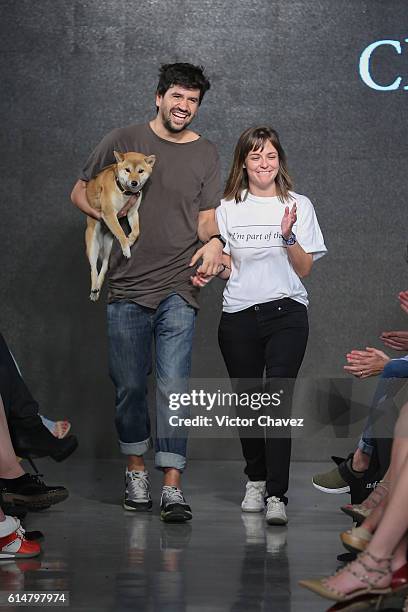 Children of Our Town creative director, Jose Alfredo Silva and Children of Our Town brand general director, Natalia Ferriz walk the runway during the...