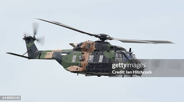 An Australian Army MRH90 helicopter performs during the T150 Defence Force Air Show on October 15, 2016 in Townsville, Australia. The Air Show forms...