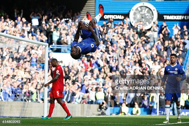 Chelsea's Nigerian midfielder Victor Moses celebrates after scoring their third goal during the English Premier League football match between Chelsea...
