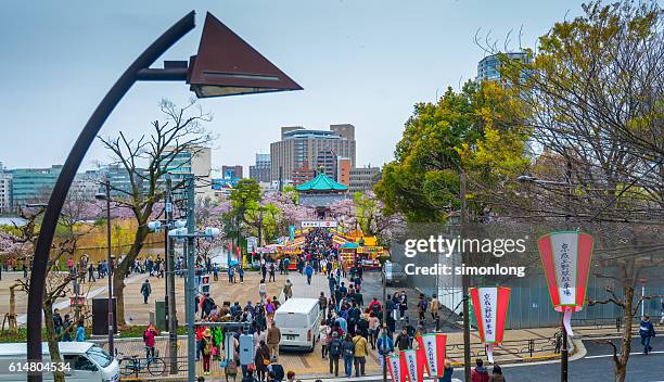 crowded ueno park - ueno park stock-fotos und bilder