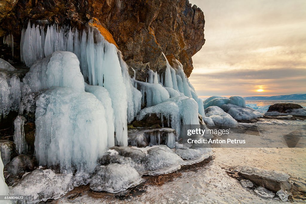 Icicles on a rock at sunset, Lake Baikal