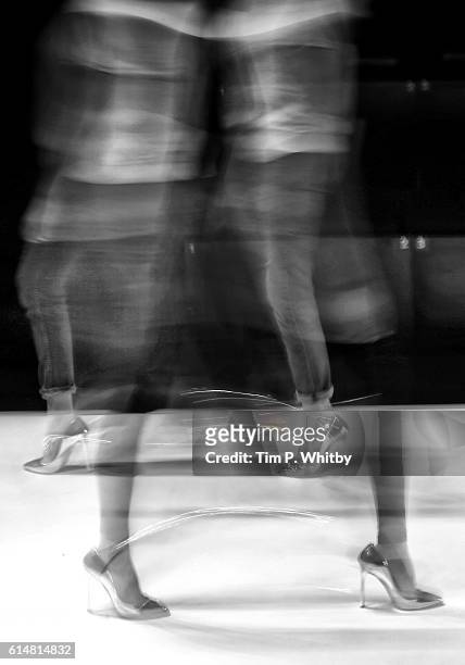 An alternative view of a model walking the runway at the Selma State show during Mercedes-Benz Fashion Week Istanbul at Zorlu Center on October 12,...
