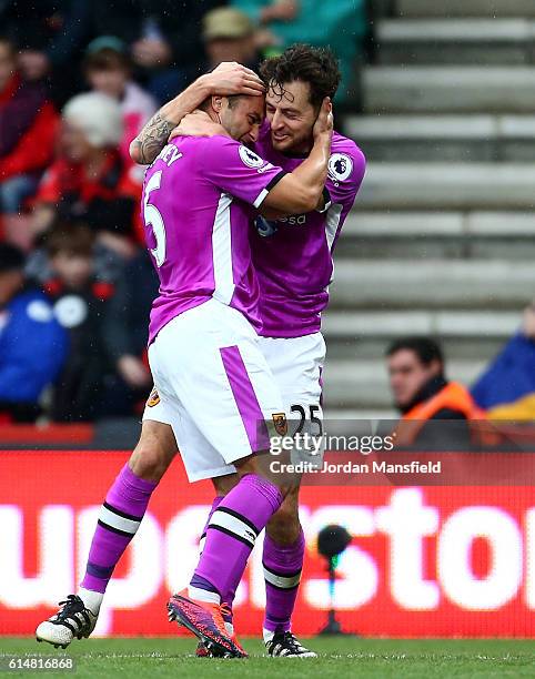 Ryan Mason of Hull City celebrates scoring his sides first goal with his team mate Shaun Maloney of Hull City during the Premier League match between...