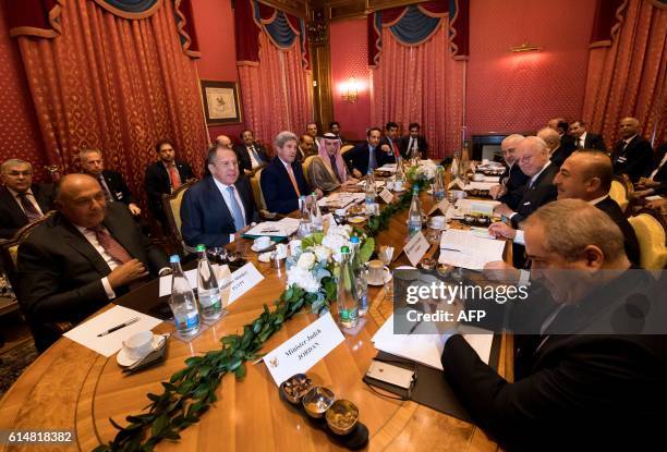 Egyptian Foreign Minister Sameh Shoukry, Russian Foreign Minister Sergei Lavrov, U.S. Secretary of State John Kerry, Saudi Arabia Foreign Minister...