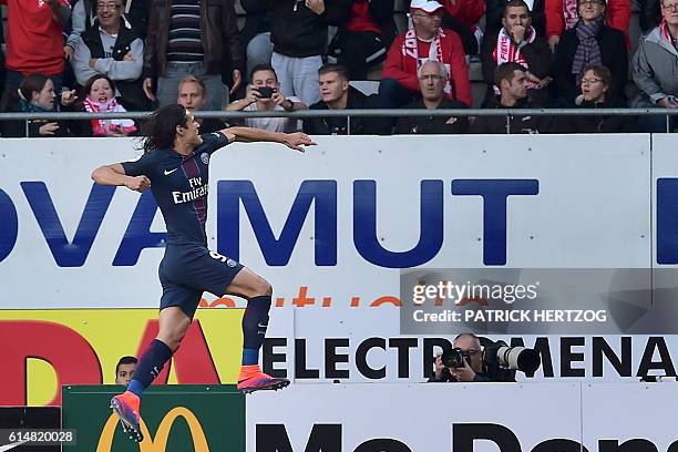 Paris Saint-Germain's Uruguayan forward Edinson Cavani celebrates after scoring a goal during the French L1 football match between Nancy and Paris on...