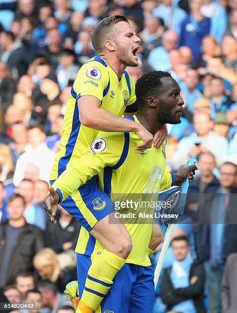 Romelu Lukaku of Everton celebrates scoring his sides first goal with his team mate Tom Cleverley of Everton during the Premier League match between...
