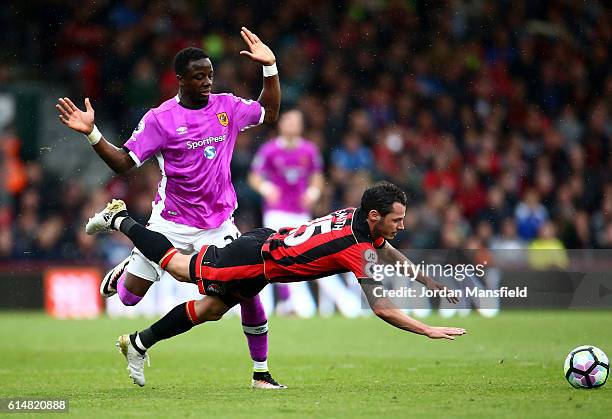 Adama Diomande of Hull City fouls Adam Smith of AFC Bournemouth during the Premier League match between AFC Bournemouth and Hull City at Vitality...