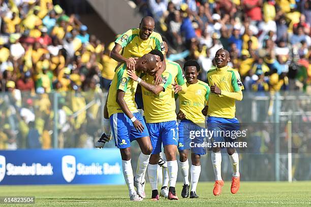 Mamelodi Sundowns' players celebrate after scoring a goal during the CAF Championship final football match on October 15, 2016 at Atteridgville...